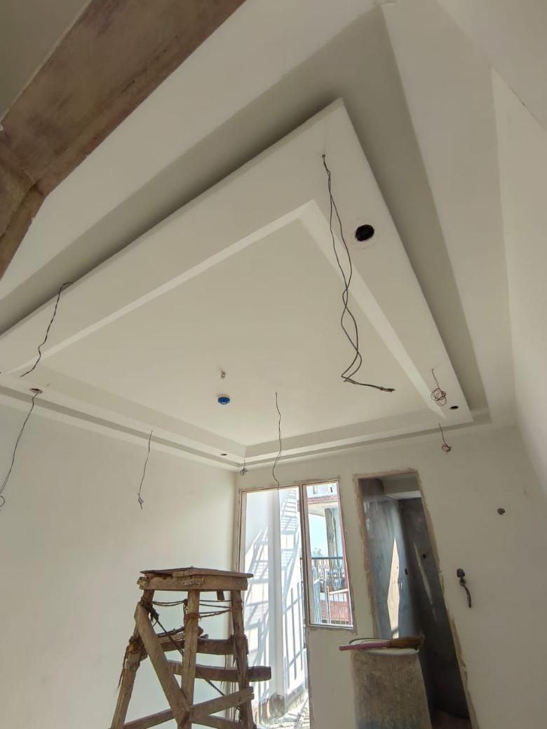 Gypsum and Wood Peripheral False Ceiling Design
